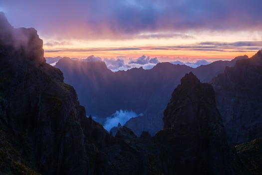 Mountains on sunset covered in fog and clouds. Madeira island, Portugal photo