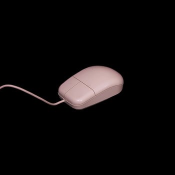 This is a Classic Computer Mouse beautifully displayed on a Black Background for emphasis photo
