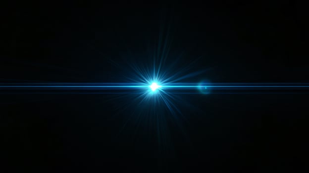 Brilliant blue flare of radiant light in dark vacuum photo