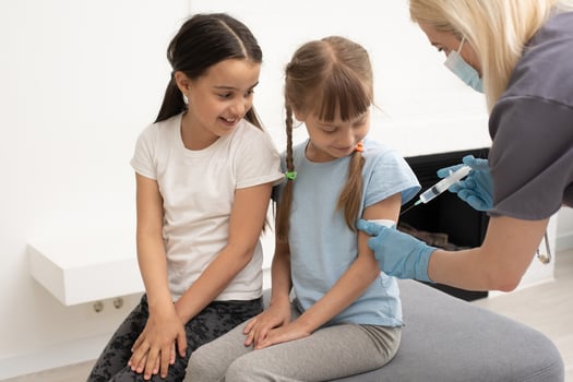 Little girl at the doctor's - pediatric checkup photo