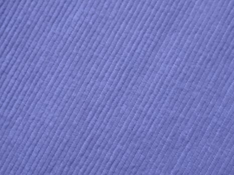 A blue fabric with a striped pattern photo