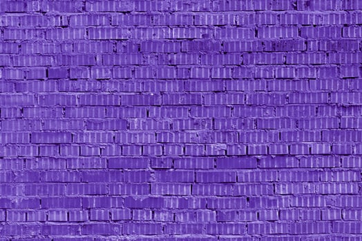 Violet brick building wall. Interior of a modern loft. Background for design and interview recording. photo