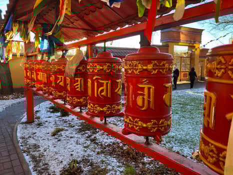 prayer wheels at the Datsan Gunzechoinei Buddhist temple photo