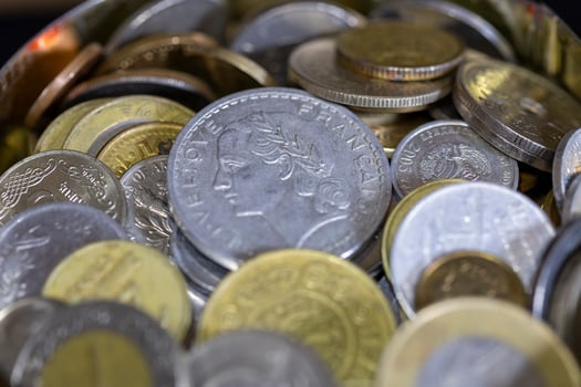 Different gold and silver coins from different countries photo