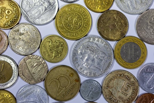 Various collectible coins from different countries photo