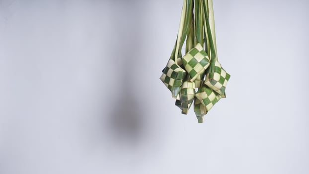 Ketupat or Rice Packaging for Eid Mubarak with Copy Space photo