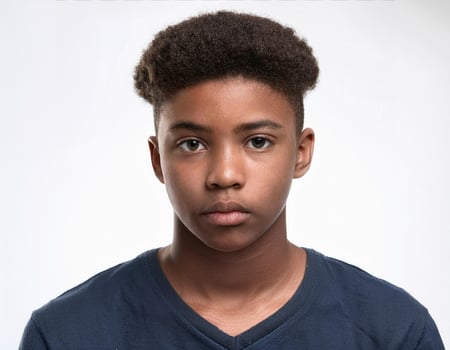 Studio Portrait of African Teenager with Neat Natural Hair on White Background photo