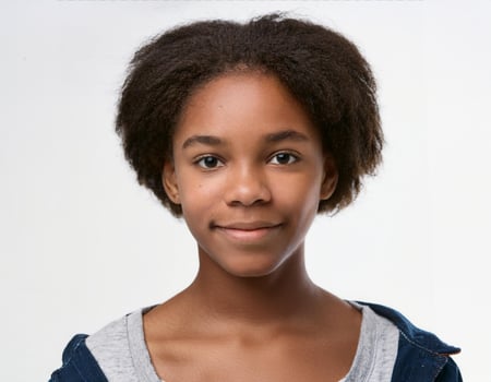 Portrait of African Teenager with High Top Curls on White Background photo