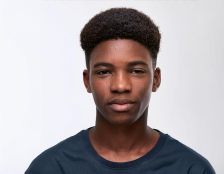 Portrait of African Teenager with Defined Medium Braids and Soft Expression on White Background photo