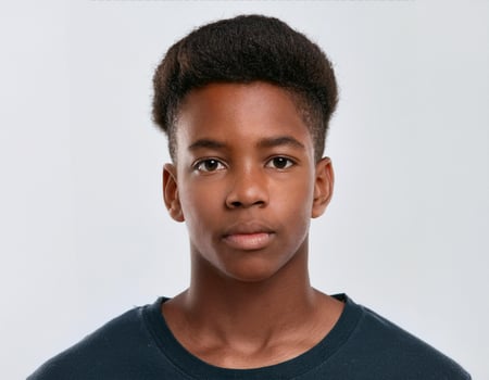 Close Up Portrait of African Teenager with Defined Side Parted Curls on White Background photo
