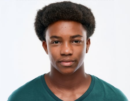 Portrait of African Teenager with Defined Medium Curls and Expression on White Background photo
