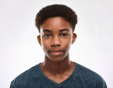 Portrait of African Teenager with Defined Defined Soft Braided Textured Curls on White Background photo