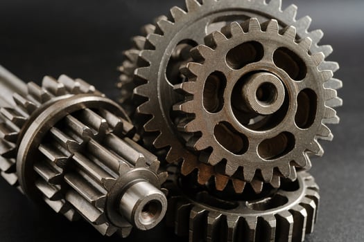 Gear and cogs wheels, clock mechanism, brass metal engine photo