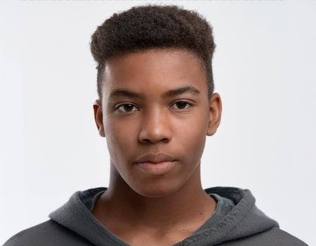 Portrait of African Teenager with Defined Defined Full Natural Braids on White Background photo