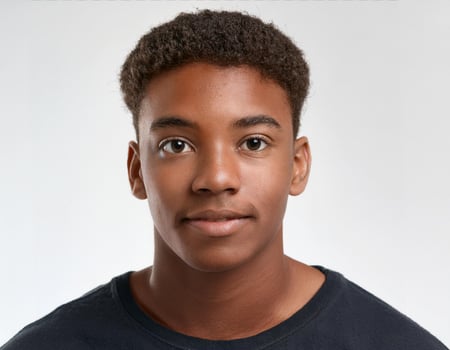 Studio Portrait of African Teenager with Defined Defined Defined Short Curly Bob on White Background photo