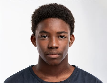 Studio Portrait of African Teenager with Defined Defined Defined Defined Full Curls and Expression on White Background photo