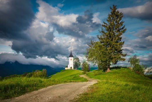 Beautiful view with Saint Primoz church, near Jamnik, Slovenia photo