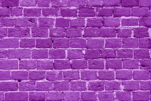 Violet brick building wall. Interior of a modern loft. photo