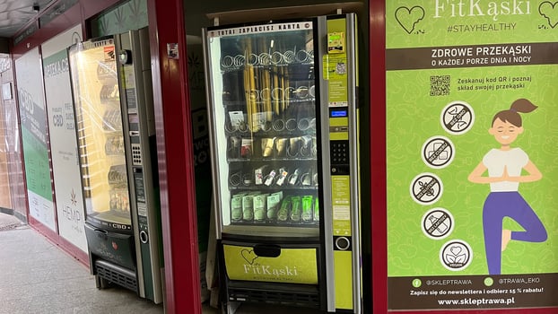 Warsaw, Poland. November 01, 2024. Two vending machines in a city setting. The machines are displaying various products. photo