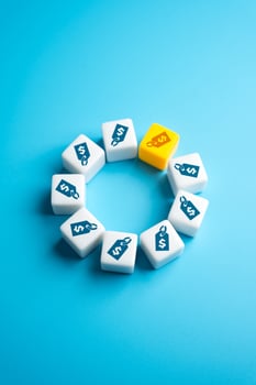 The yellow price tag stands out from the rest. Marketing technologies, advertising, outreach and customer acquisition. Best price. Shopping and retail. photo