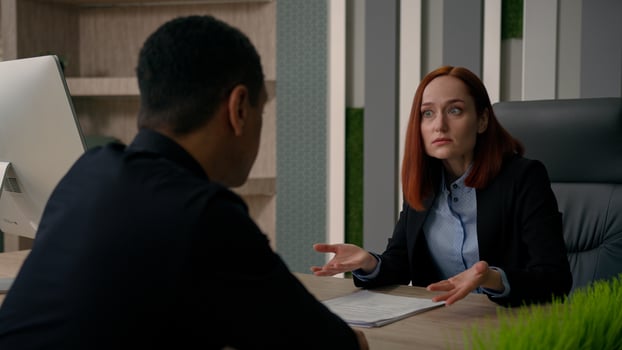 Two multiracial businesswoman and businessman work with computer business online project Caucasian woman consult African American man client customer service at office help with offer bank insurance photo