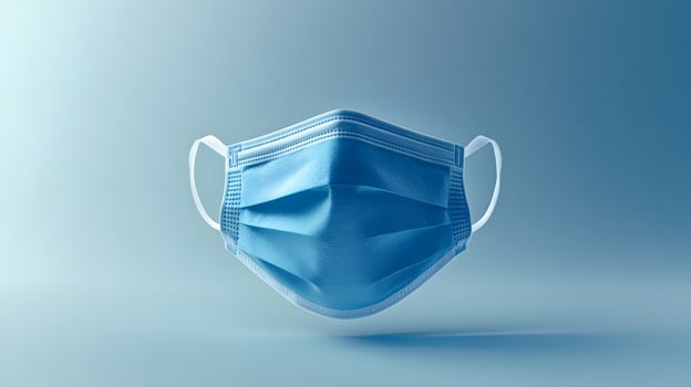 Simple blue surgical mask illustration floats against pure white background. Clean design emphasizes medical protection with subtle shadow beneath disposable face covering. necessary photo