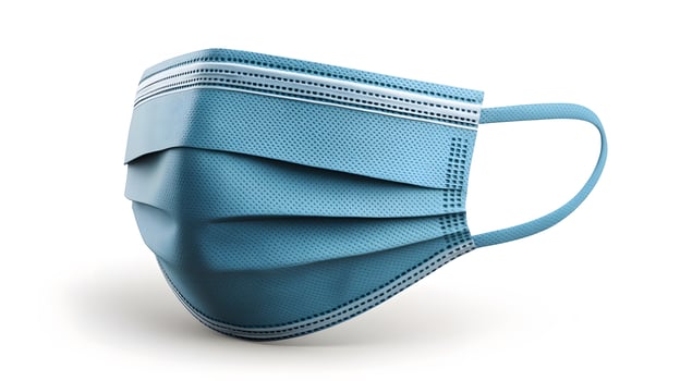 Simple blue surgical mask illustration floats against pure white background. Clean design emphasizes medical protection with subtle shadow beneath disposable face covering. critical photo