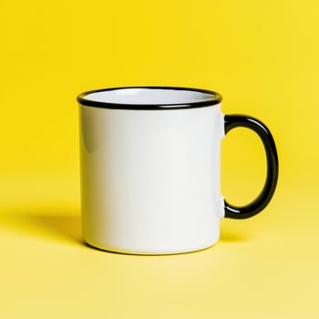 White mug on yellow background. photo