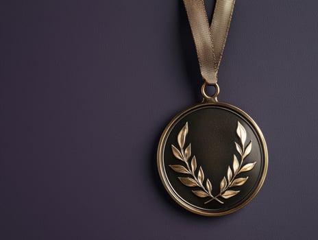Gold medal with laurel wreath on dark background photo