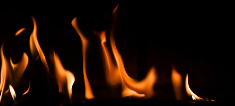 Red blaze Fire flame on a black background photo