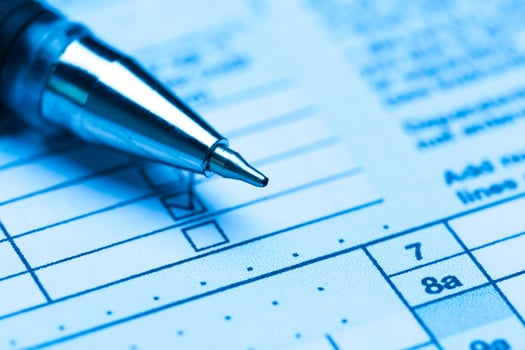 US tax form with pen photo