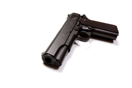 hand gun isolated on white background photo