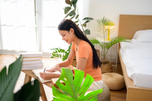 University woman doing homework .... photo
