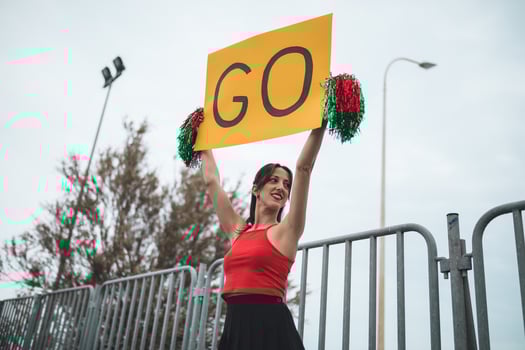 Cheerleader Girl Cheers Her Heart Basketball Team On The Stands photo