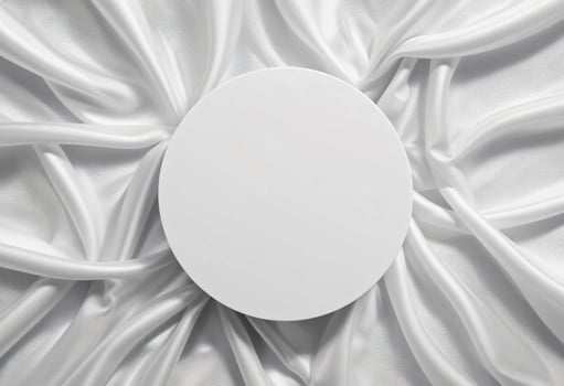 Top view of round podium stand for cosmetics product presentation on smooth elegant white cloth fabric background photo
