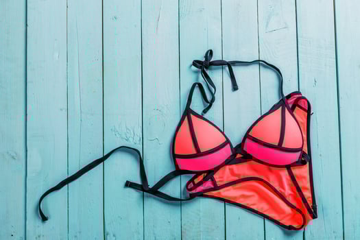 Set of beach clothes. Pink bikini photo