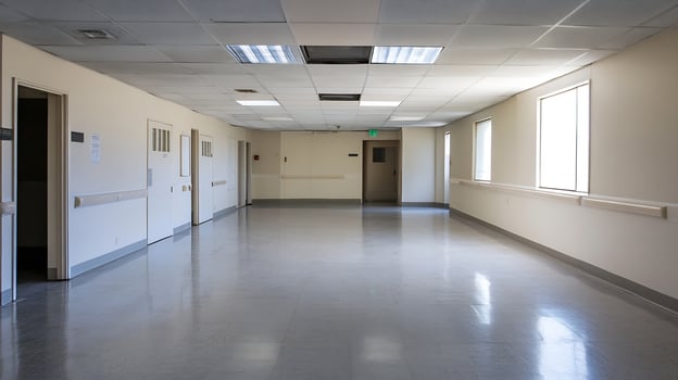 Bright Hospital Corridor With Polished Floor Illuminated by Natural Light photo