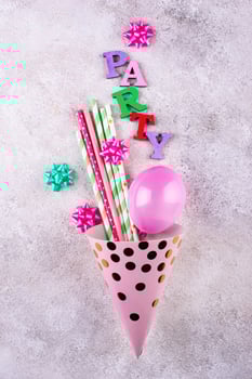 Birthday party celebration concept with papaer hat photo