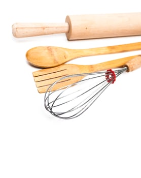 Old Wooden kitchen utensils isolated on white background photo