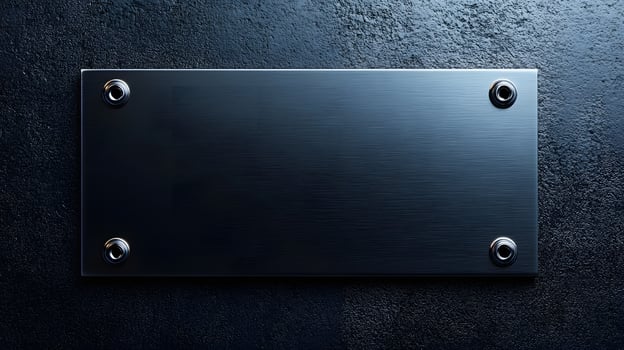 Brushed steel black metal plate exhibits sleek industrial design with rectangular shape and dark finish, mounted on wall with soft ambient lighting. finish photo