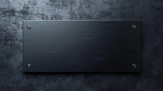 Brushed steel black metal plate exhibits sleek industrial design with rectangular shape and dark finish, mounted on wall with soft ambient lighting. contemporary photo
