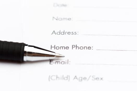 Close-up of pen on contract photo