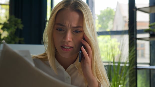 Caucasian businesswoman talk mobile phone arguing negative emotion dissatisfied wrong business contract financial report documents mistake stressed angry entrepreneur girl woman call smartphone shout photo