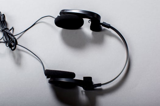 Audio Headphones with Cord on Grey Background photo