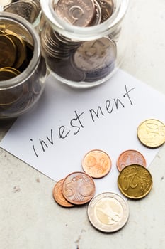 Money jar with coins photo