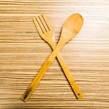 kitchenware on wooden background photo