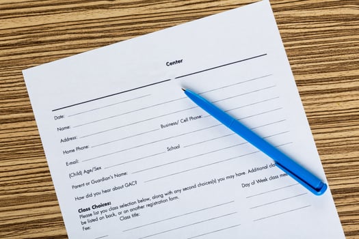 Pen and contract papers on wooden desk photo