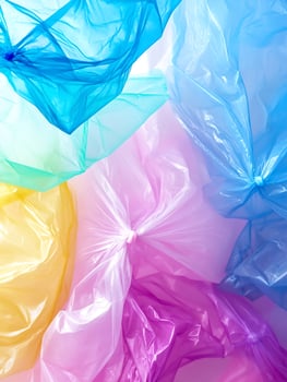 Colorful Translucent Plastic Bags Arranged in a Vibrant Abstract Composition photo