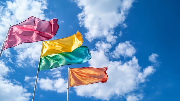 Colorful Flags Flying in Blue Sky Symbolizing Diversity and Celebration photo