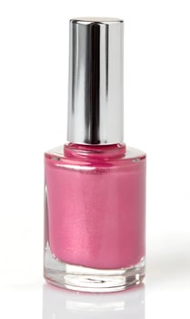 pink nail polish isolated on white photo